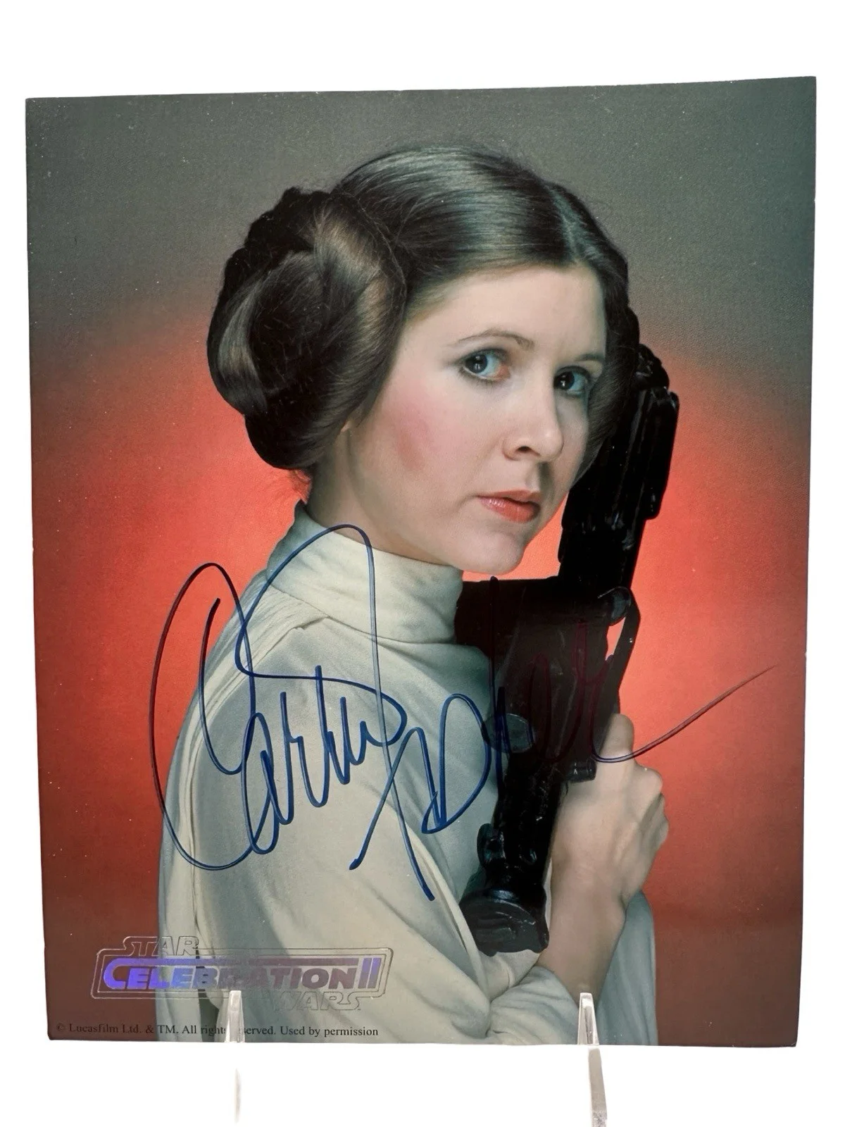 Carrie Fisher — Carrie Fisher Signed Star Wars Princess Leia Celebration II 8x10 Blaster COA/LOA, изображение 3