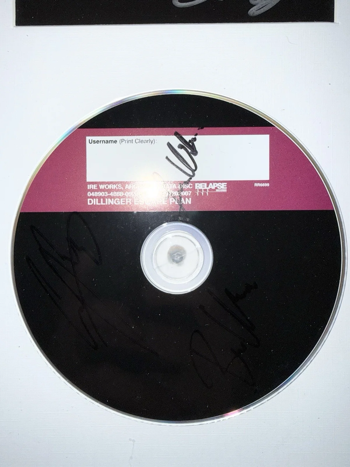 Ben Weinmen, Greg Puciato, Liam Wilson, Gil Sharone, Jeff Tuttle — THE DILLINGER ESCAPE PLAN - Framed ‘IRE WORKS’ SIGNED Booklet + SIGNED CD, image 3