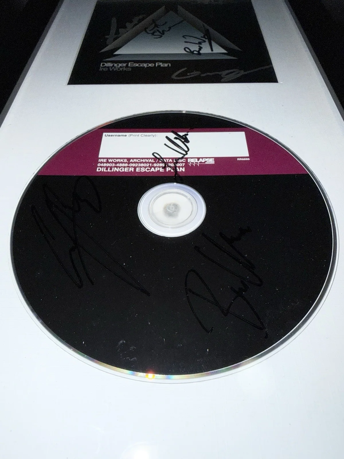 Ben Weinmen, Greg Puciato, Liam Wilson, Gil Sharone, Jeff Tuttle — THE DILLINGER ESCAPE PLAN - Framed ‘IRE WORKS’ SIGNED Booklet + SIGNED CD, image 4