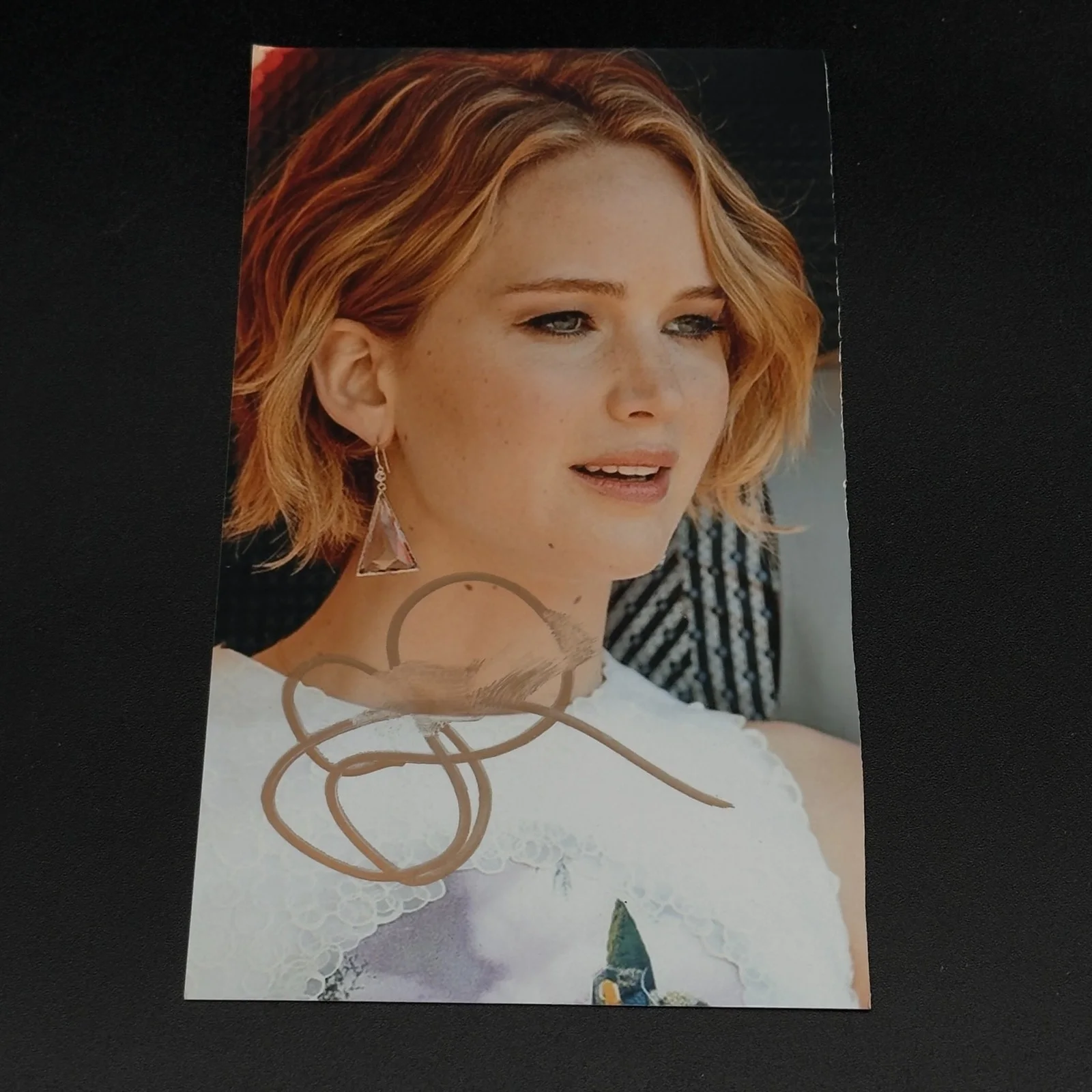 Jennifer Lawrence — ​JENNIFER LAWRENCE Cut Photo Autograph Hunger Games Hand Signed Auto - Smudge