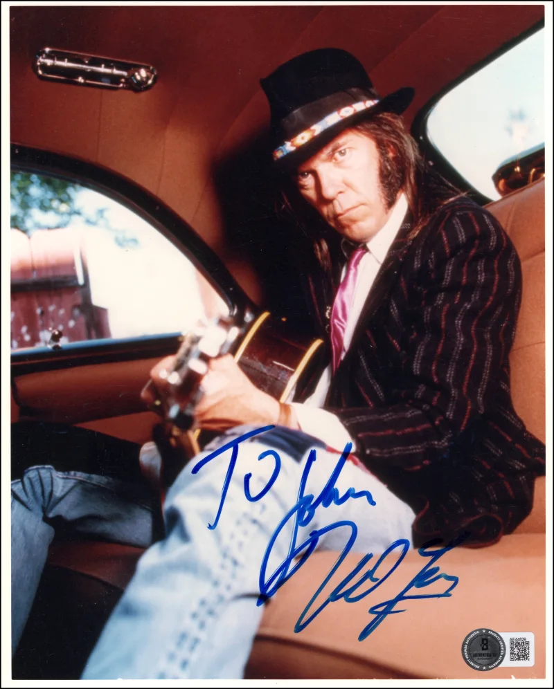 Neil Young — Neil Young CSNY Signed Autograph 8x10 Photo - Crosby Stills Nash w/ Beckett COA