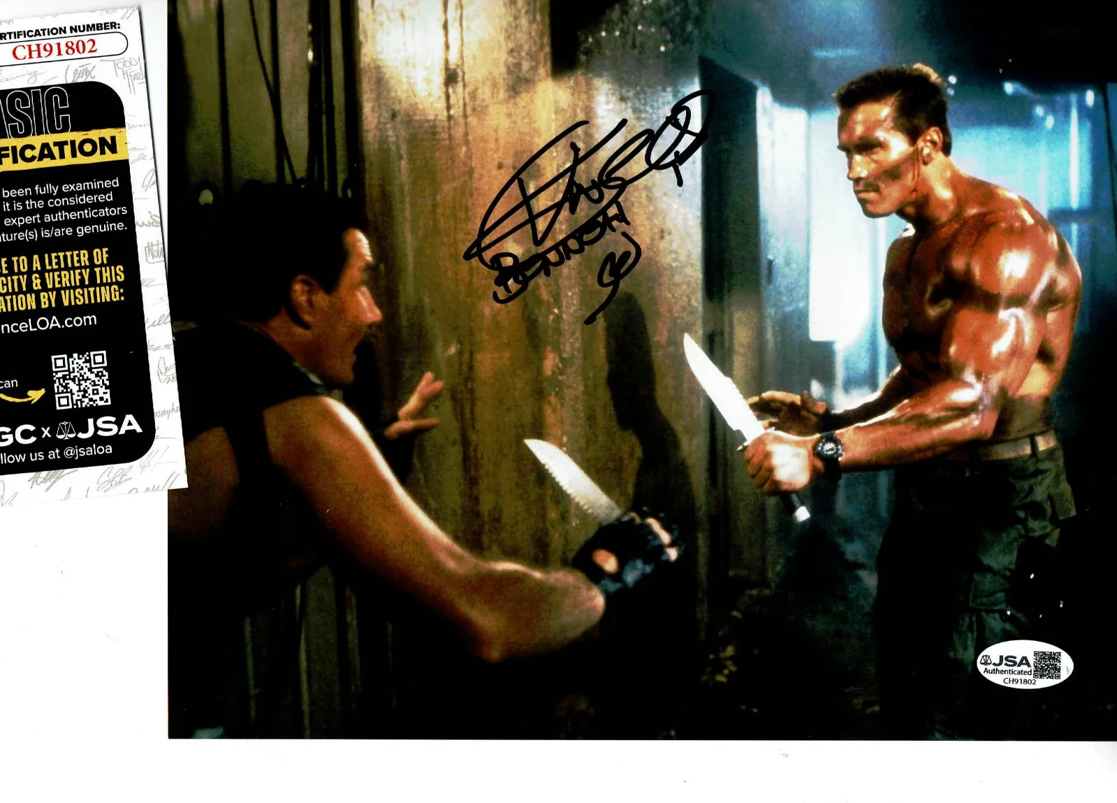 Vernon Wells — Commando Vernon Wells autographed 8x10 color photo with Arnold JSA Certified