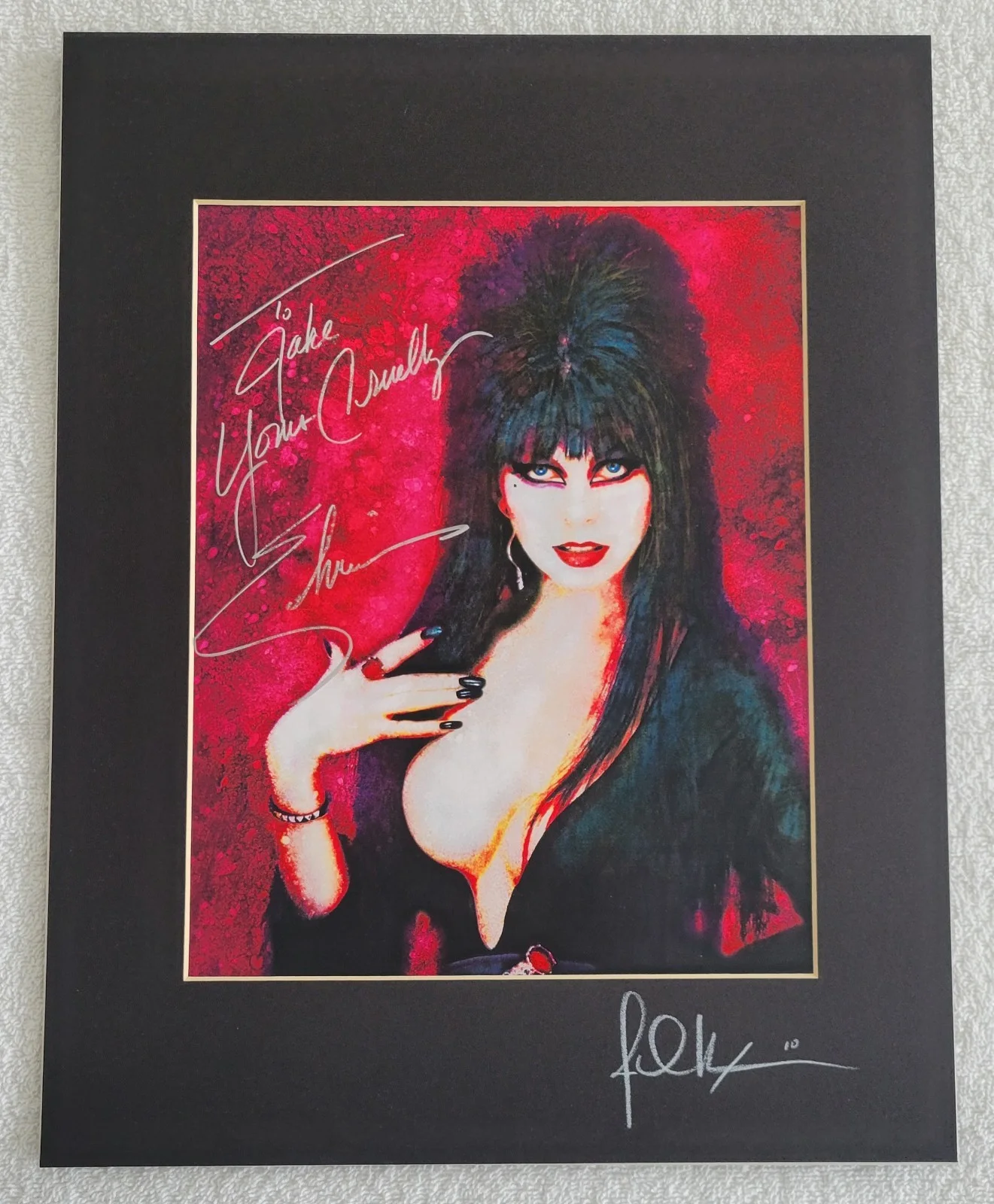 Cassandra Peterson Elvira — Cassandra Peterson "Elvira" Autographed 11x17" Matted Print w/Inscription