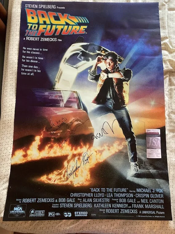 MICHAEL J FOX, CHRISTOPHER LLOYD, LEA THOMPSON — BACK TO THE FUTURE MOVIE POSTER 27X40 SIGNED MICHAEL J FOX LEA INSCRIPTION! JSA
