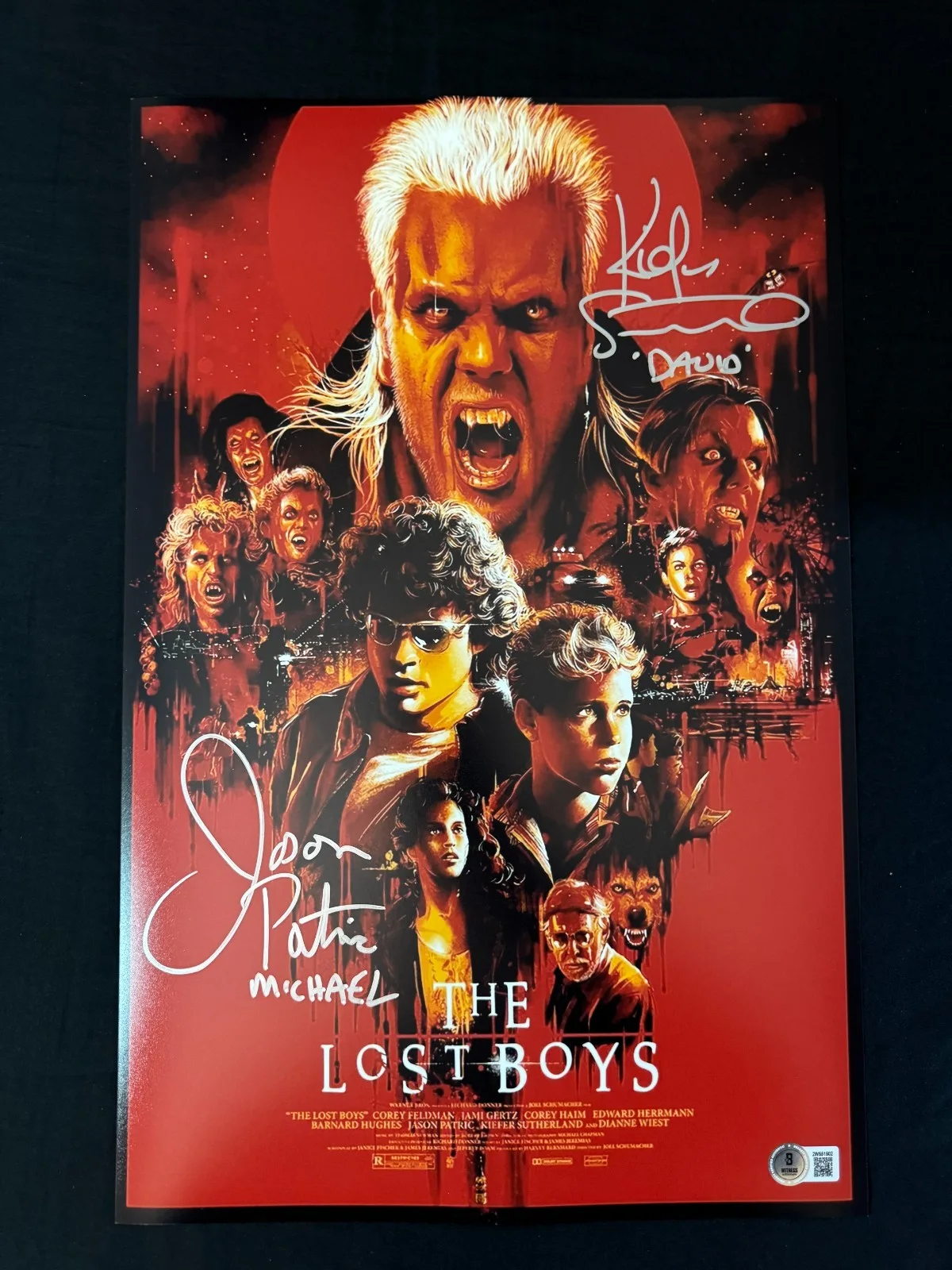 Jason Patric and Kiefer Sutherland — Kiefer Sutherland & Jason Patric signed The Lost Boys 11x17 photo W/Beckett COA