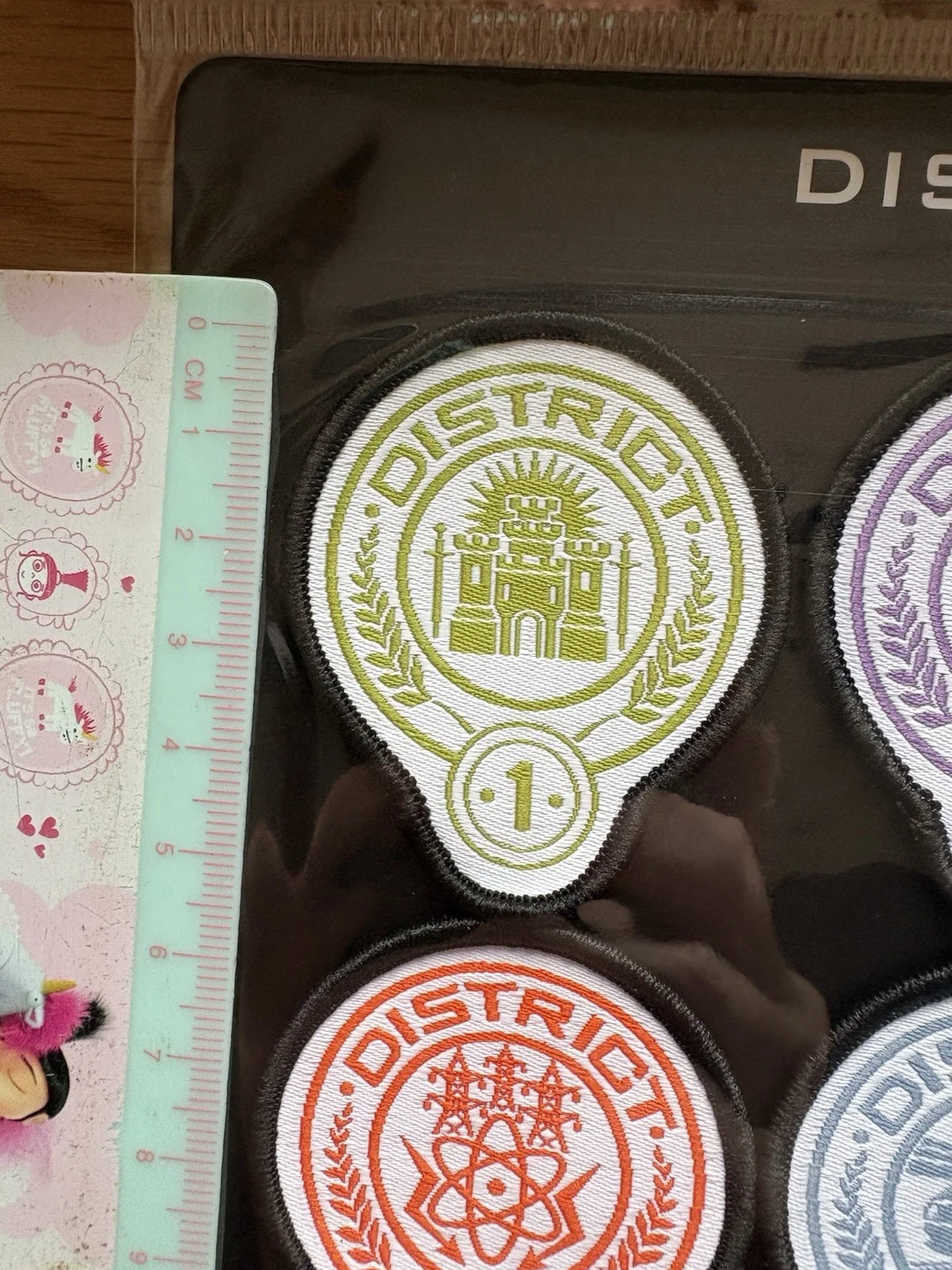Hunger Games Live On Stage District Patches Merchandise Brand New Sealed, изображение 3