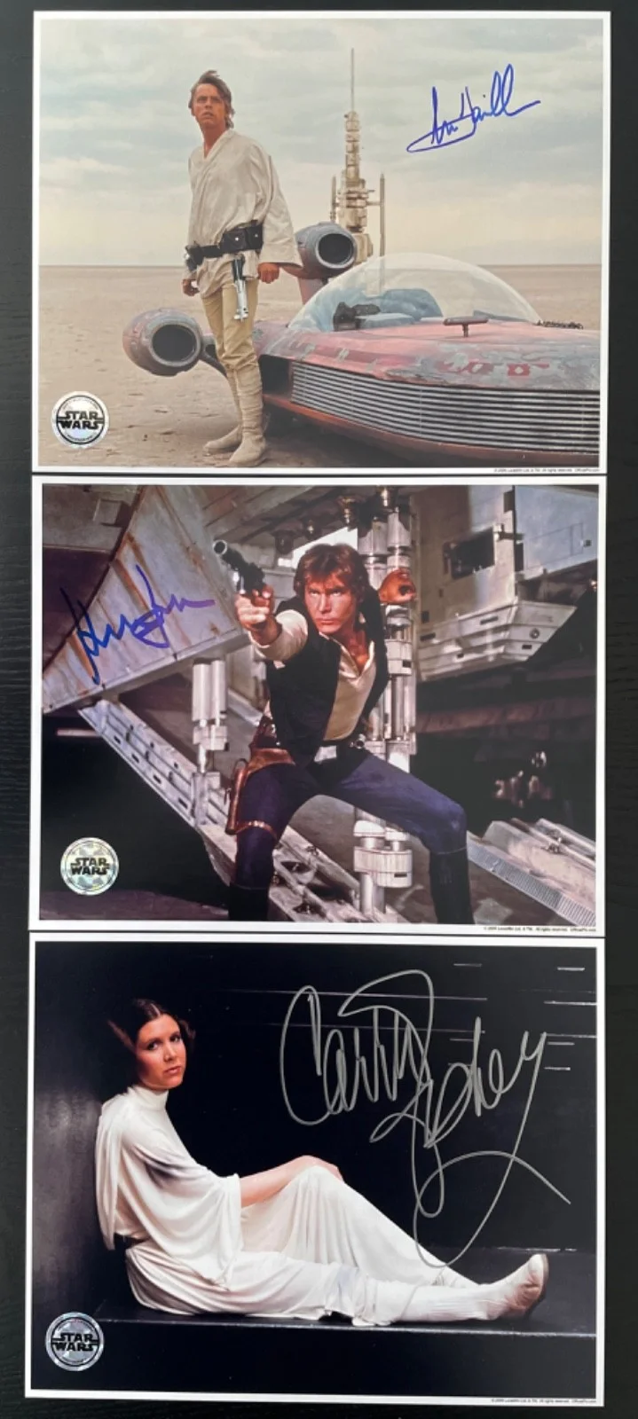 Harrison Ford, Mark Hamill, Carrie Fisher — Harrison Ford, Mark Hamill, Carrie Fisher Star Wars Signed 8x10 OPX Photos.