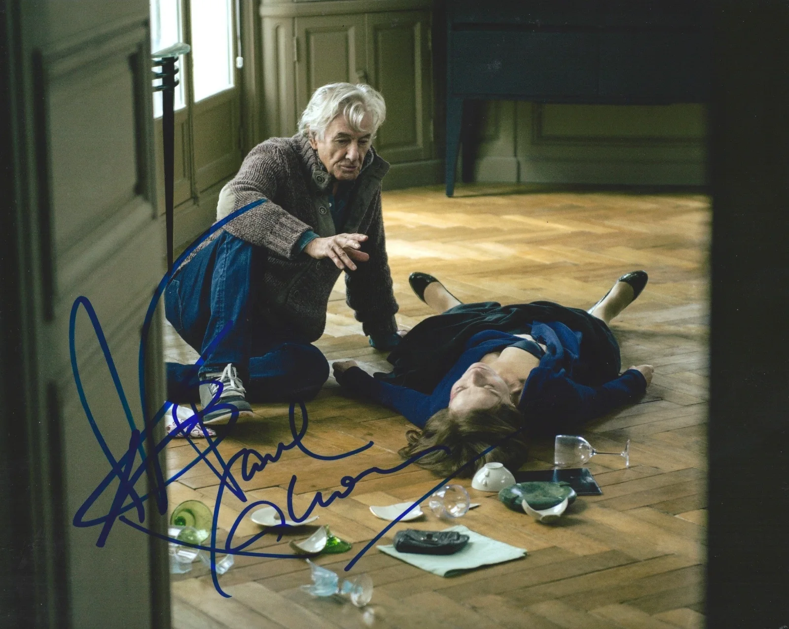 Paul Verhoeven & Isabelle Huppert — Paul Verhoeven & Isabelle Huppert signed Elle 8x10 photo - In Person Proof