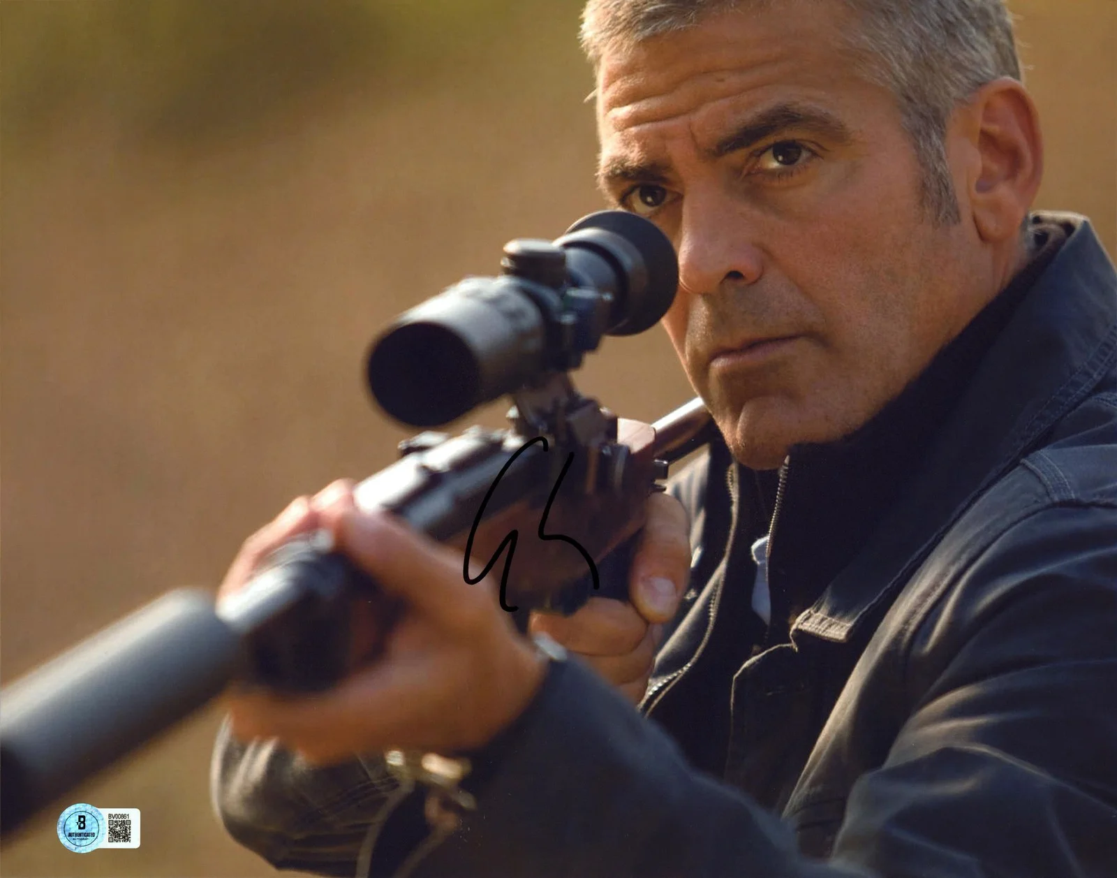 George Clooney — George Clooney The American Authentic Signed 11x14 Horizontal Photo BAS #BV00861