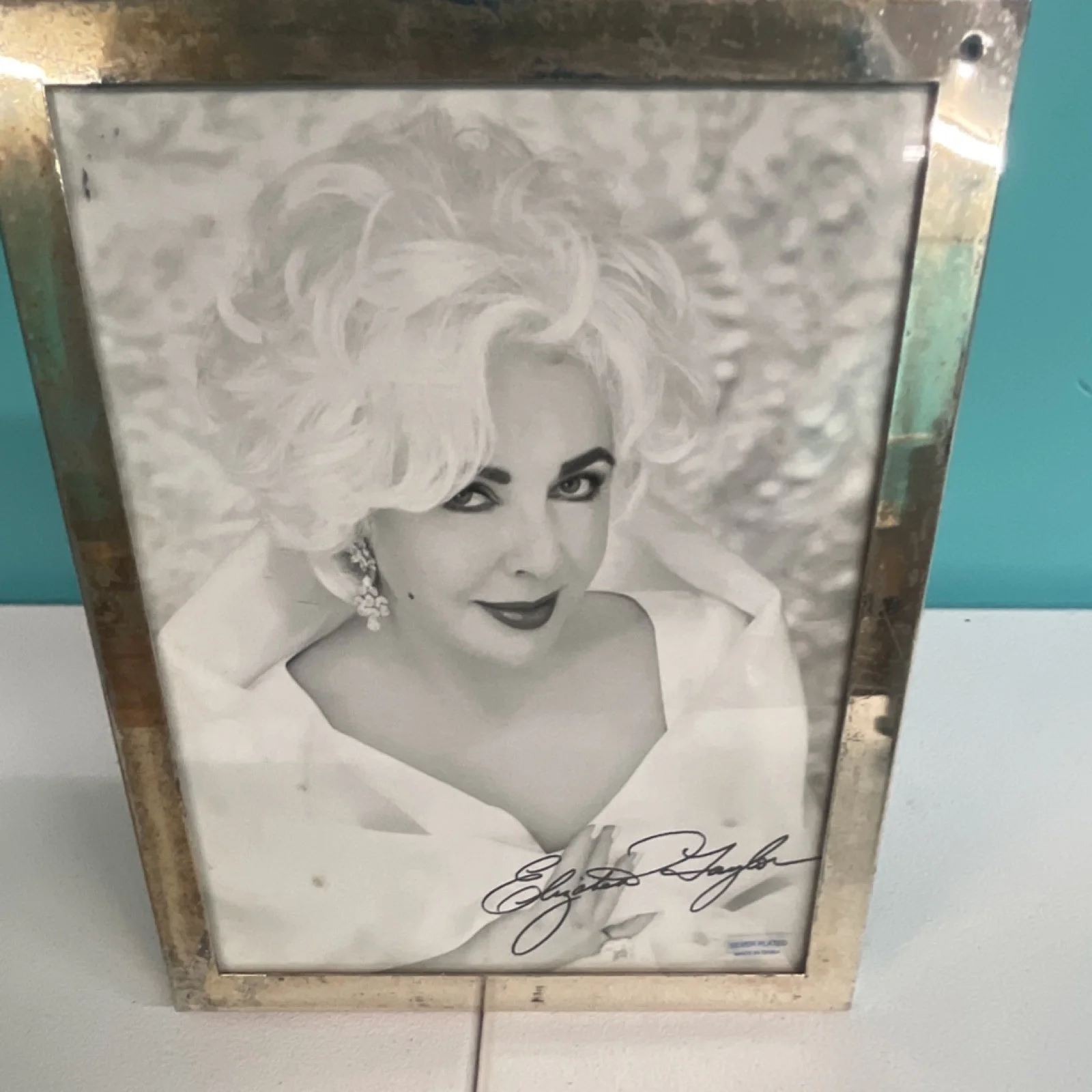 Elizabeth Taylor — Elizabeth Taylor Autographed Beckett Original Black-and-White Framed Photograph