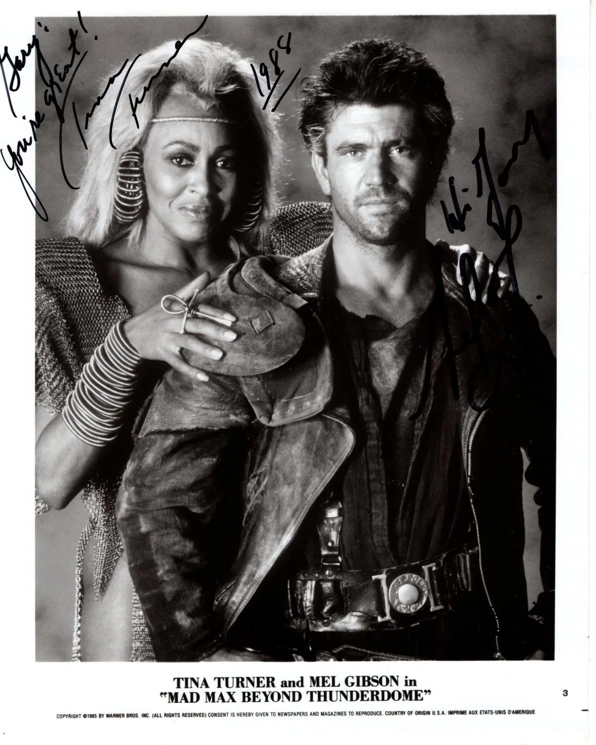 Tina Turner and Mel Gibson — TINA TURNER MEL GIBSON Signed 8x10 MAD MAX Original Press Photo - To Gary DATED