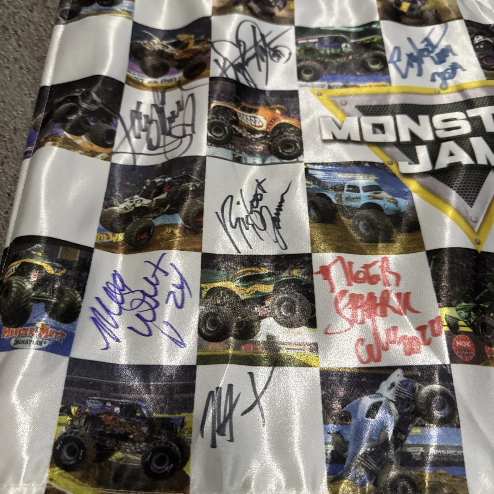Megalodon / Grave Digger / MORE — Autographed 2019 Monster Jam Flag | 21”x15” | Signed By 11 Various Drivers, image 3