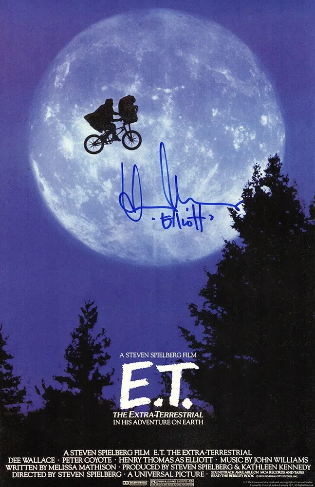 Websites — Henry Thomas Signed E.T. 11x17 Movie Poster w/Elliott - (SCHWARTZ COA)