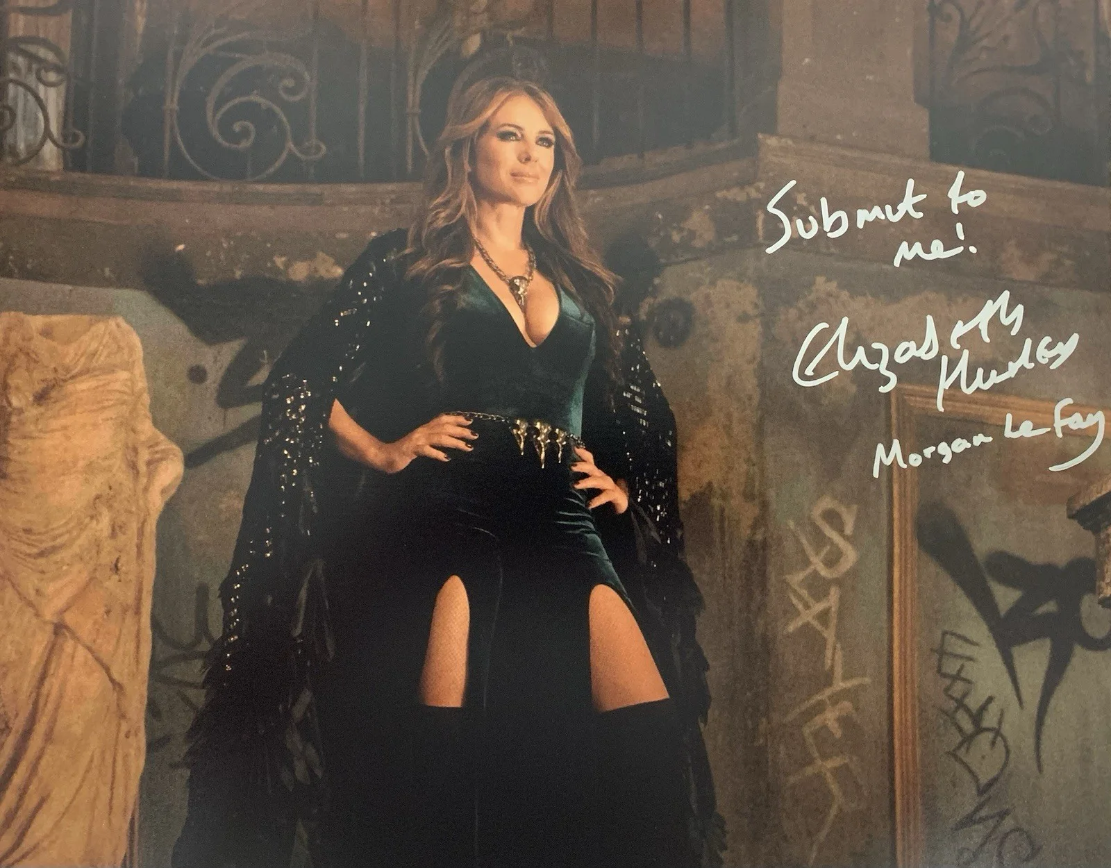 Elizabeth Hurley — Elizabeth Hurley "Morgan Le Fay" Signed/Inscribed 11x14 Photo - Everest/BAS Cert