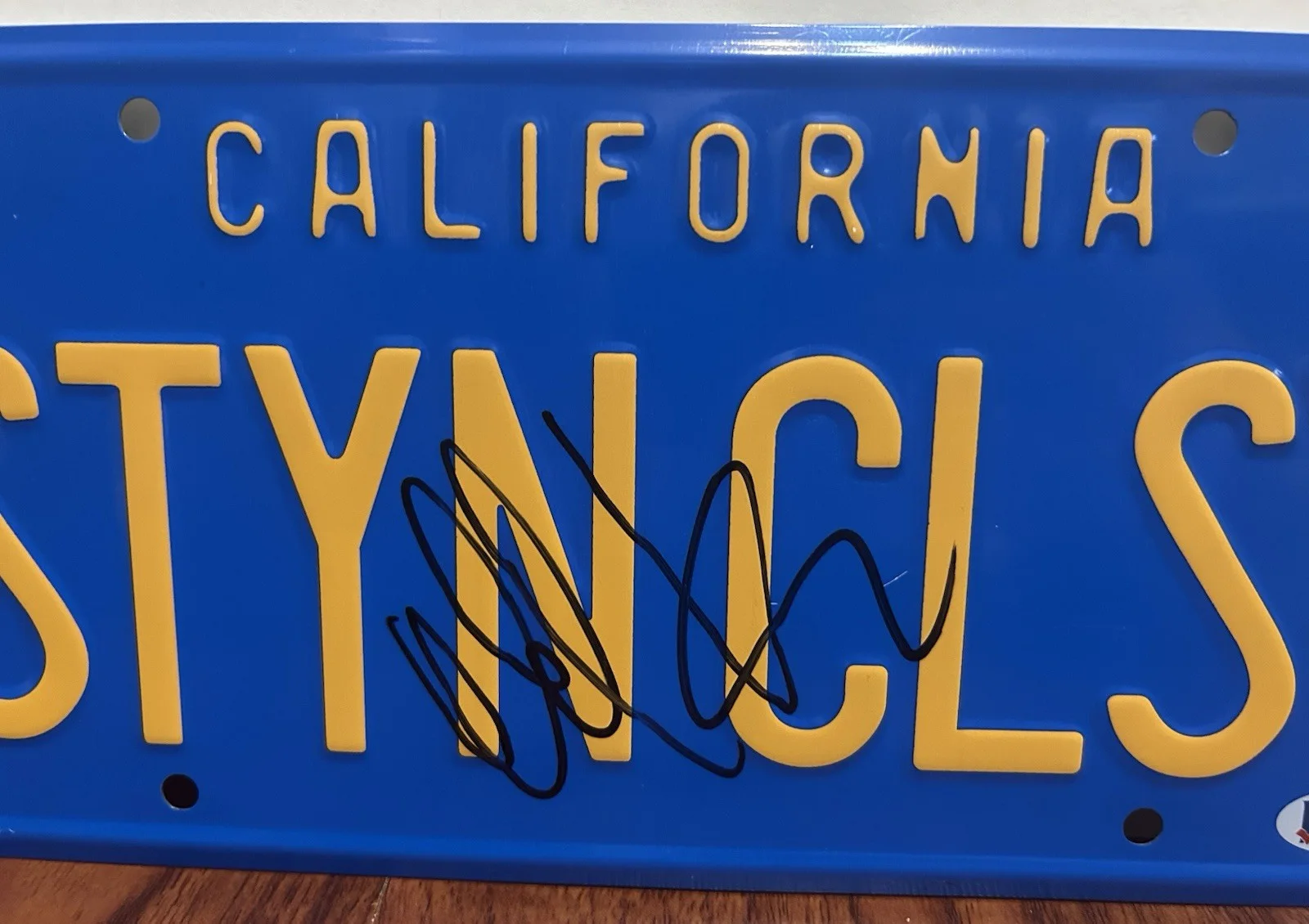 David Koechner — DAVID KOECHNER SIGNED ANCHORMAN CHAMP KIND STYNCLSY LICENSE PLATE BECKETT BAS, image 3