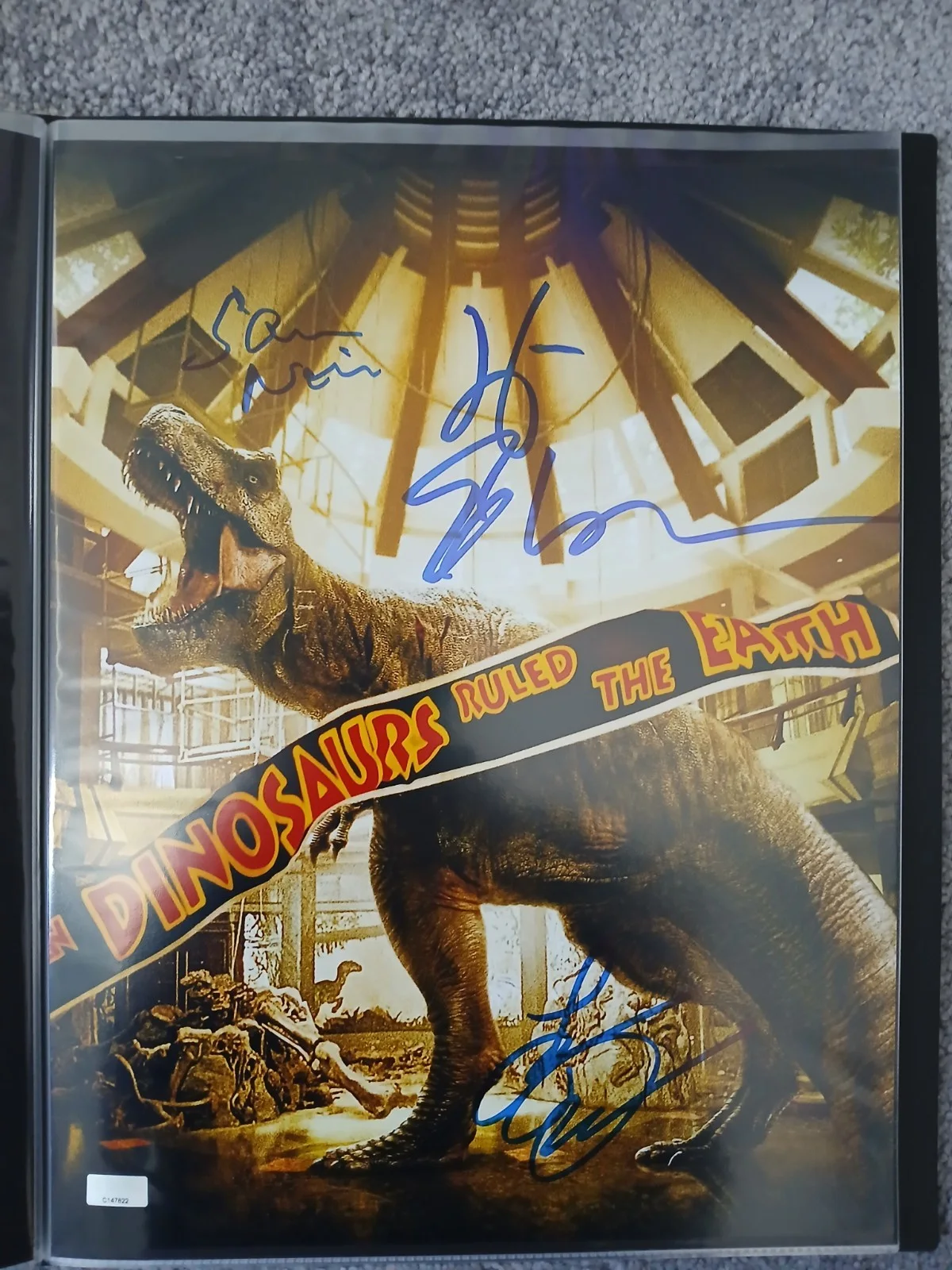 Sam Neill, Laura Dern, & Jeff Goldblum — Sam Neill, Jeff Goldblum & Laura Dern Signed Jurassic Park 11x14, CA COA, SWAU