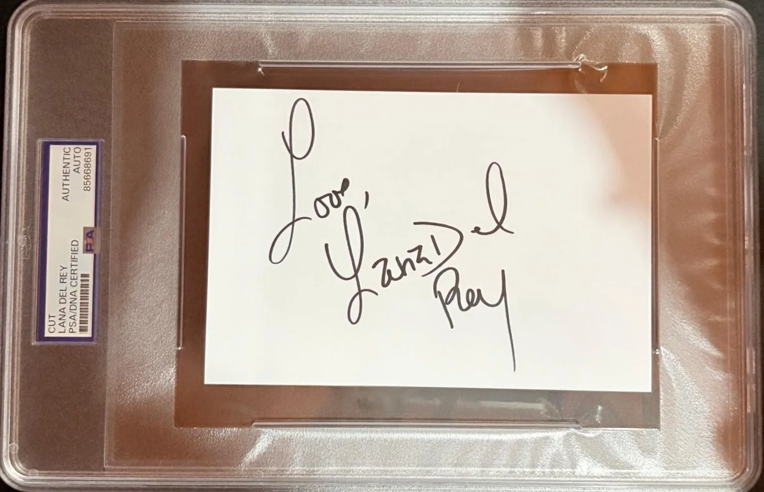 Lana Del Rey — LANA DEL REY SIGNED CUT ENCAPSULATED PSA SUMMERTIME SADNESS WEST COAST G