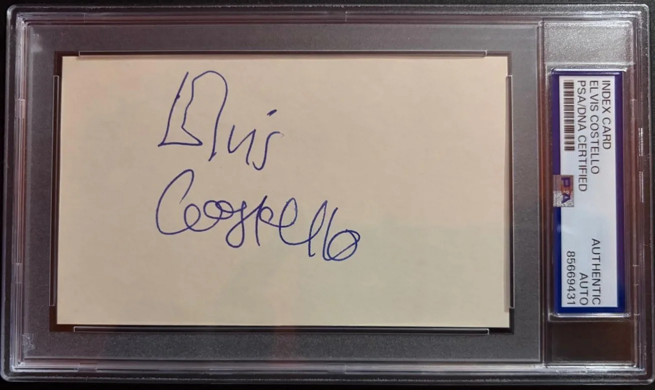 Elvis Costello — ELVIS COSTELLO SIGNED AUTOGRAPH INDEX CARD ENCAPSULATED PSA FULL NAME VINTAGE
