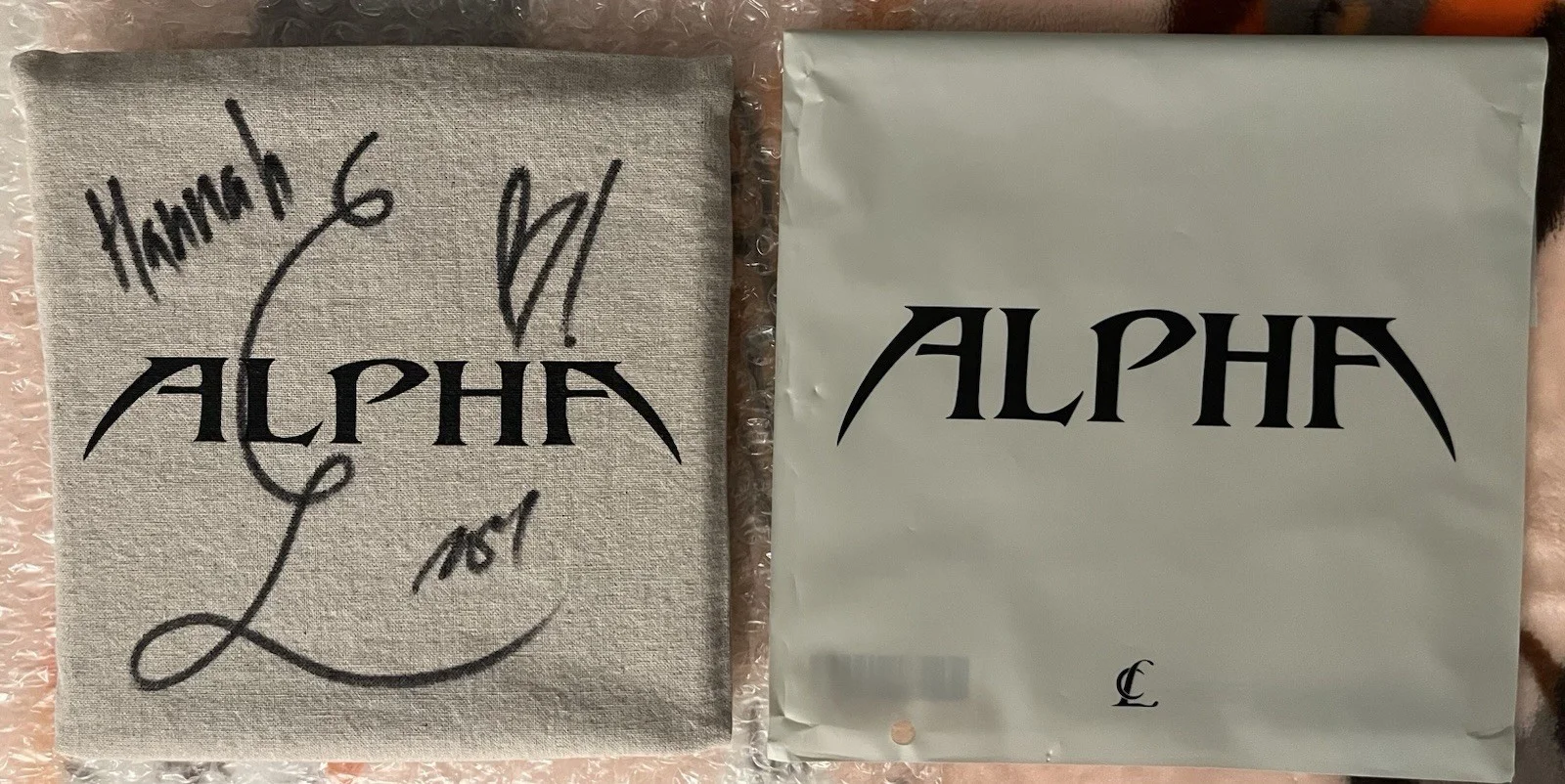 2NE1 CL signed Alpha album, image 2