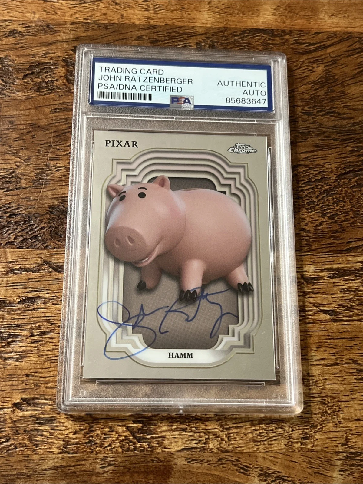 John Ratzenberger — John Ratzenberger IP Signed Disney Topps Chrome Card PSA DNA Slab Autographed