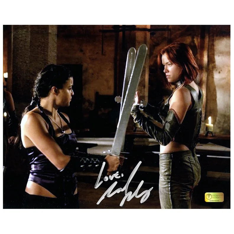 Michelle Rodriguez — Michelle Rodriguez Autographed BloodRayne Katarin and Rayne 8x10 Photo