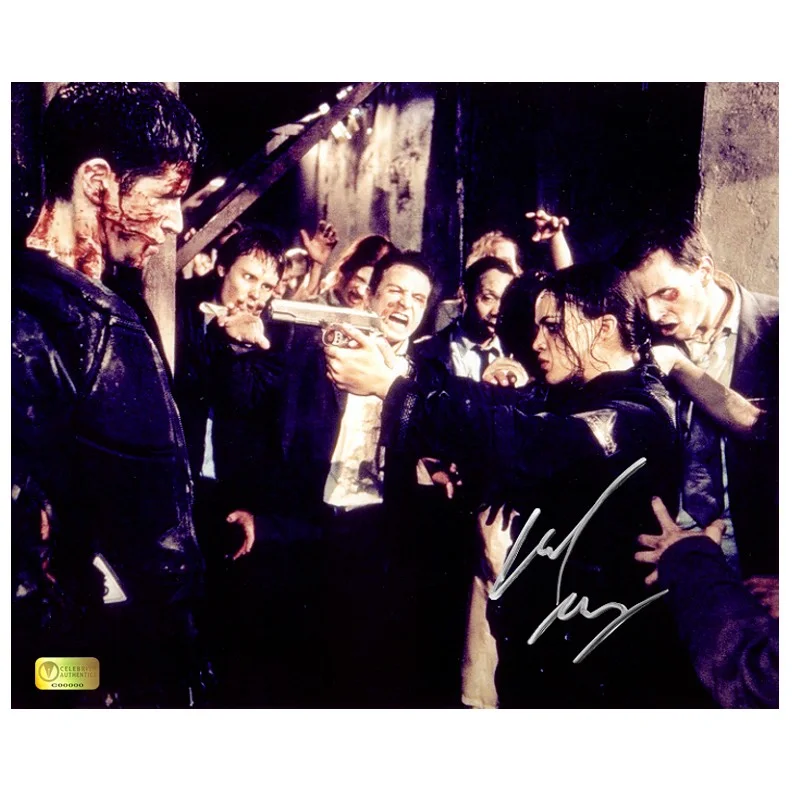 Michelle Rodriguez — Michelle Rodriguez Autographed Resident Evil Rain Zombie Attack 8x10 Scene Photo