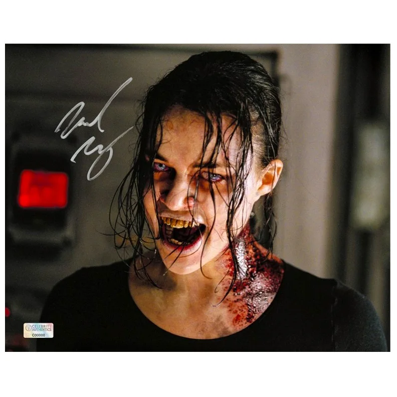 Michelle Rodriguez — Michelle Rodriguez Autographed Resident Evil Zombie 8x10 Photo
