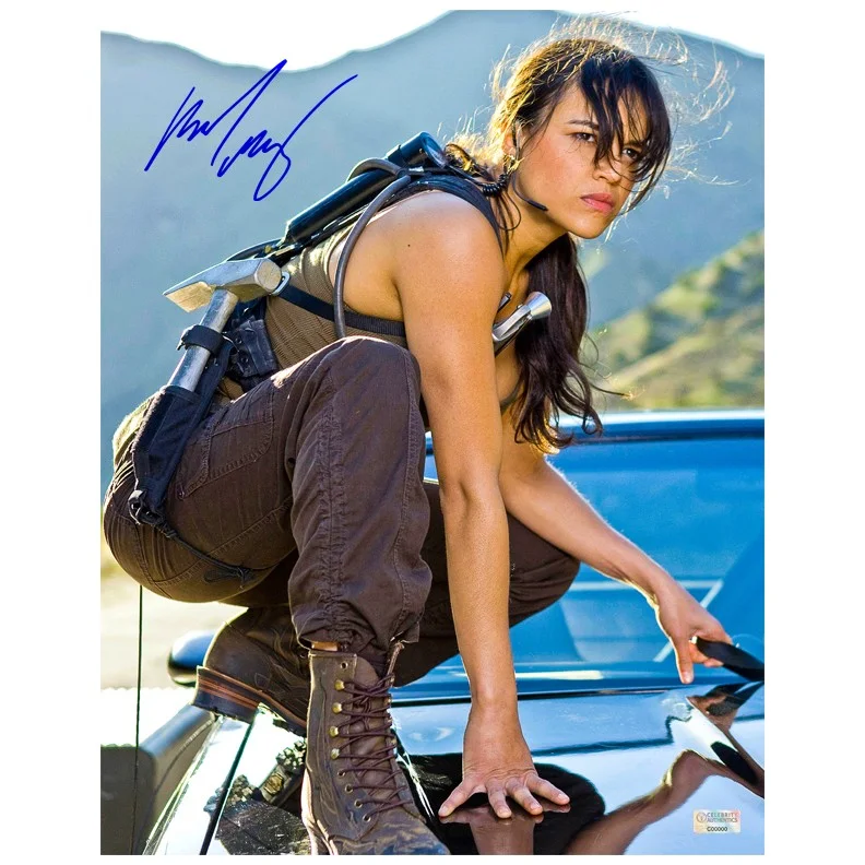 Michelle Rodriguez — Michelle Rodriguez Autographed Fast and Furious Letty 11x14 Action Scene Photo