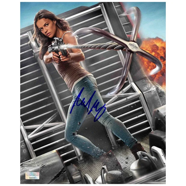 Michelle Rodriguez — Michelle Rodriguez Autographed Universal Studios Fast & Furious Ride 8x10 Photo