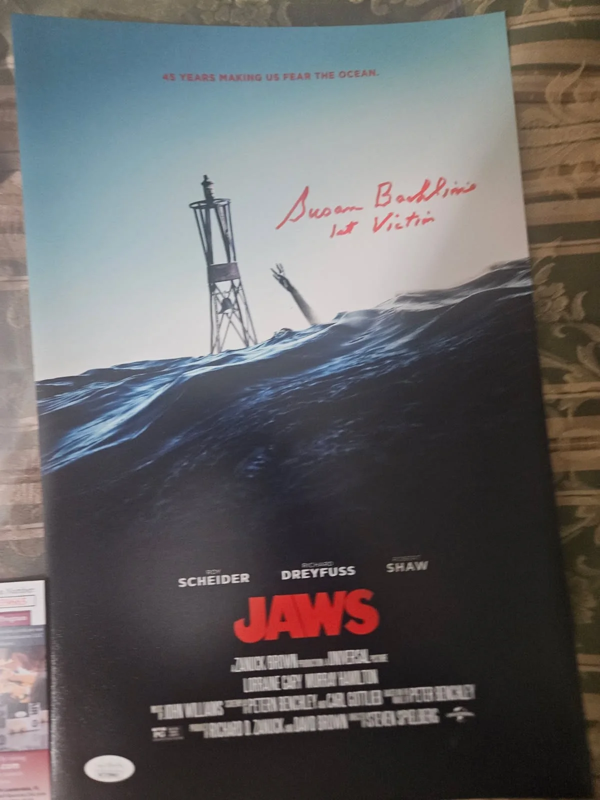 Jaws 1st victim — JAWS 1st victim autographed 11x17 swimming buoy in red photo JSA Certified