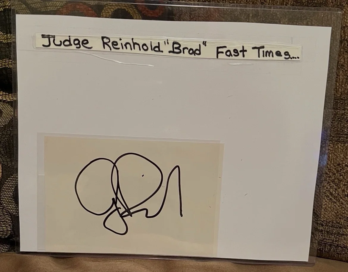 JUDGE REINHOLD JSA CERTIFIED SIGNED CUT, C.O.A. & FAST TIMES 8x10 PHOTO, изображение 2