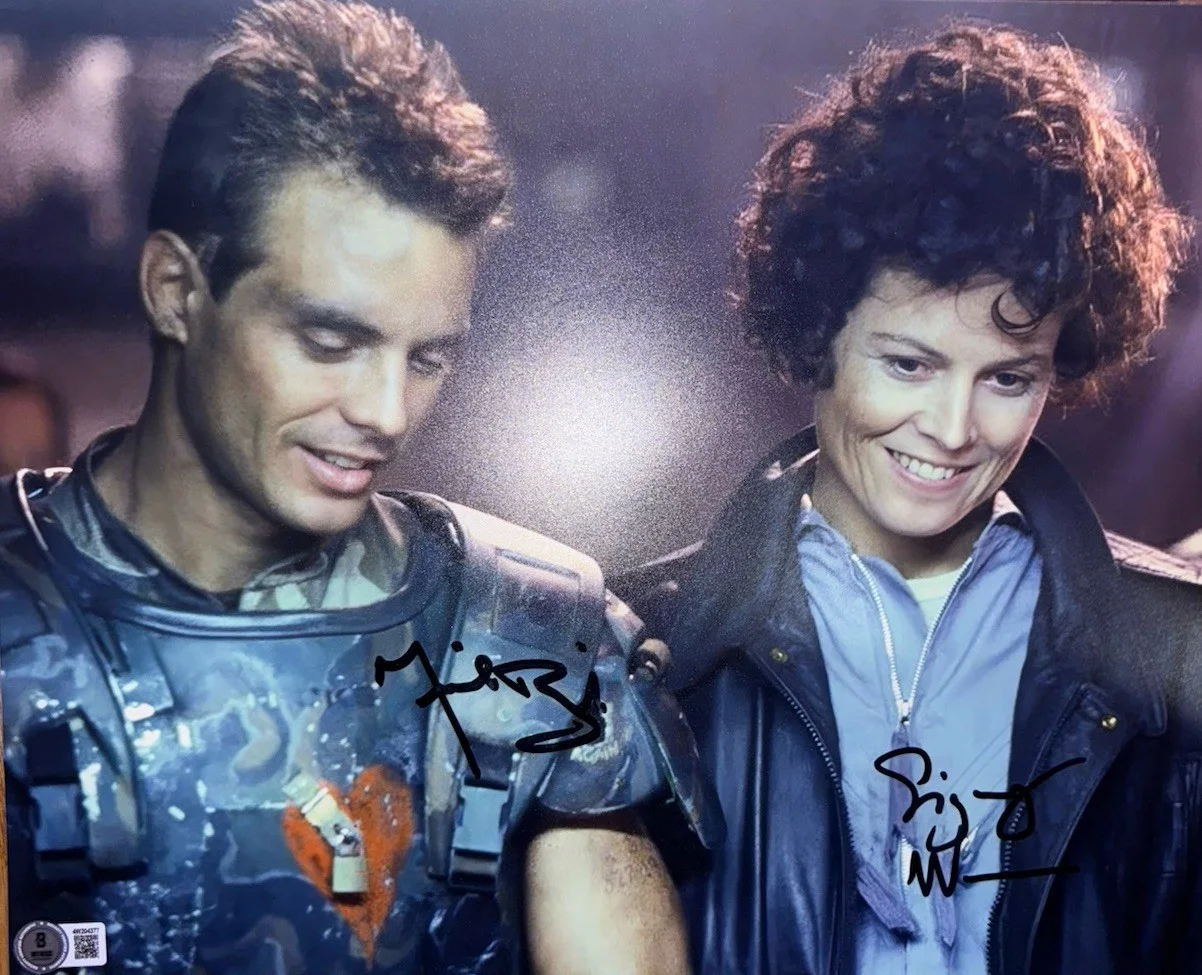 Sigourney Weaver — ALIENS SIGOURNEY WEAVER & MICHAEL BIEHN SIGNED 11x14 PHOTO BECKETT BAS WITNESSED
