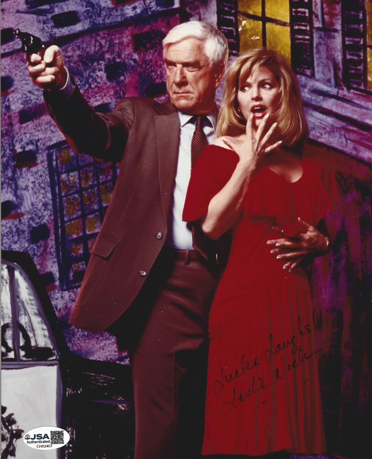 Leslie Nielsen — Leslie Nielsen REAL hand SIGNED Naked Gun Photo JSA COA Priscilla Presley