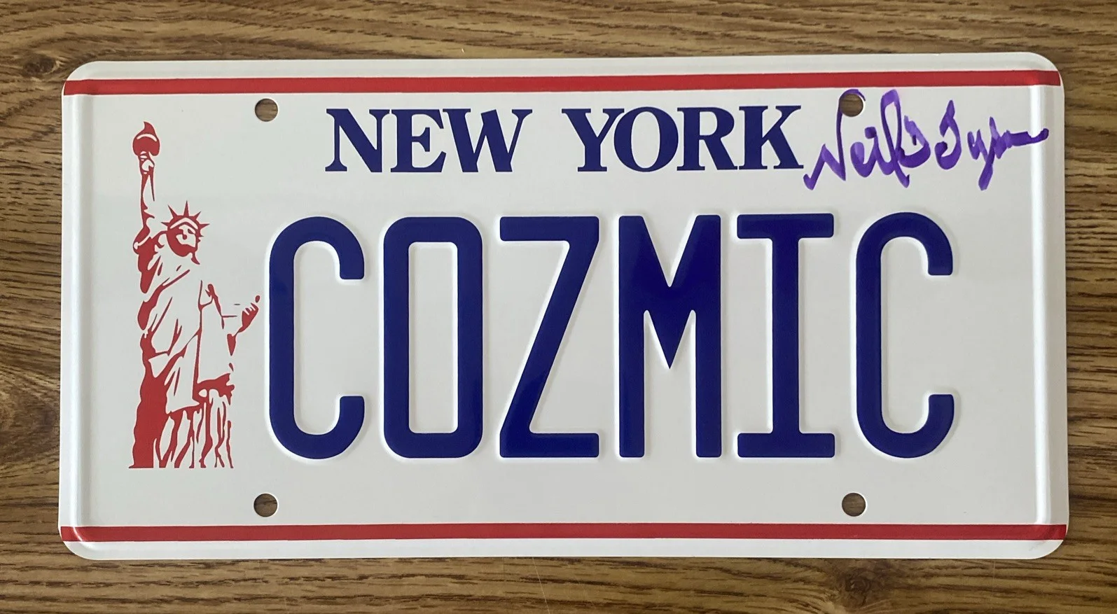 Neil deGrasse Tyson — Neil deGrasse Tyson Autographed Big Bang Theory "Cozmic" License Plate