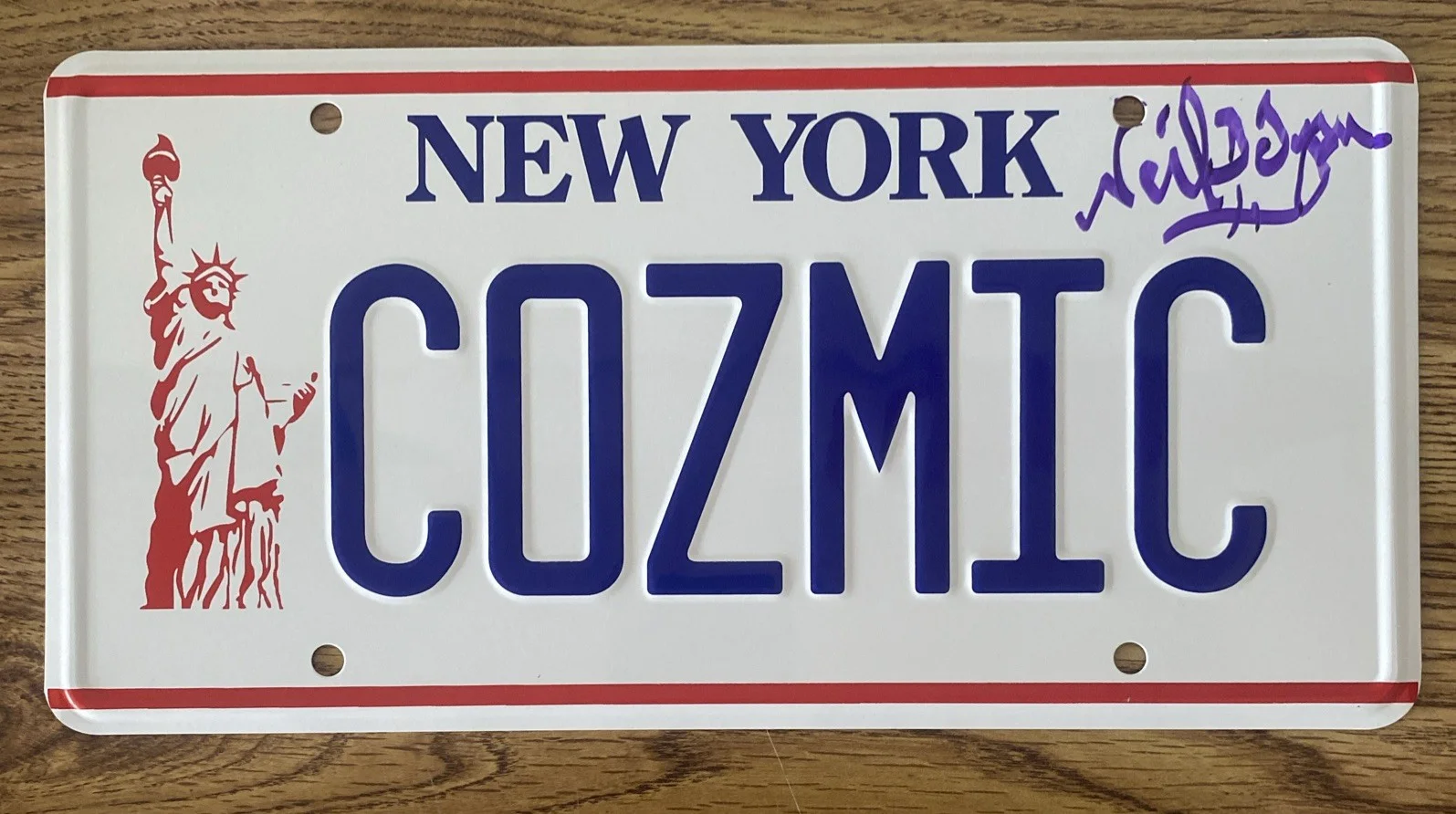 Neil deGrasse Tyson — Neil deGrasse Tyson Autographed Big Bang Theory "Cozmic" License Plate