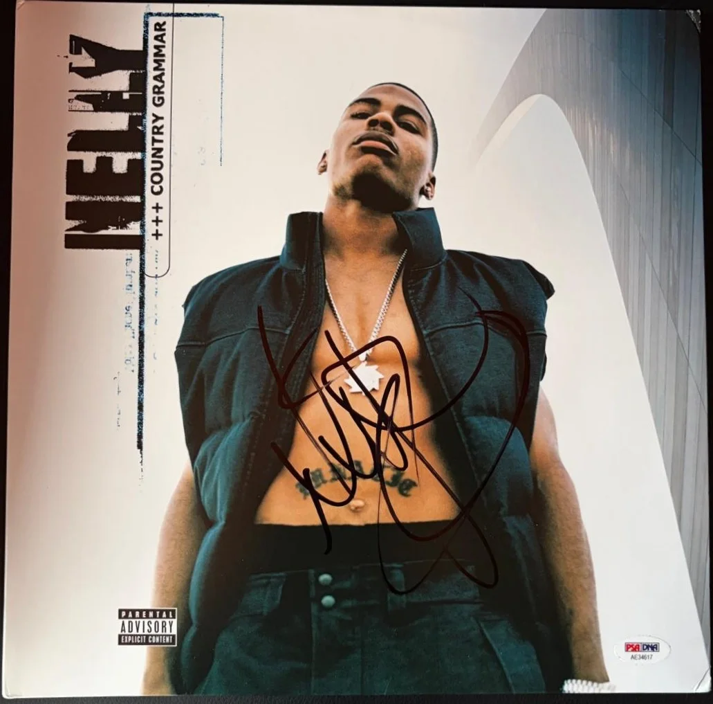 Nelly — NELLY SIGNED AUTOGRAPHED ALBUM COVER COUNTRY GRAMMAR ST LOUIE RARE PSA COA