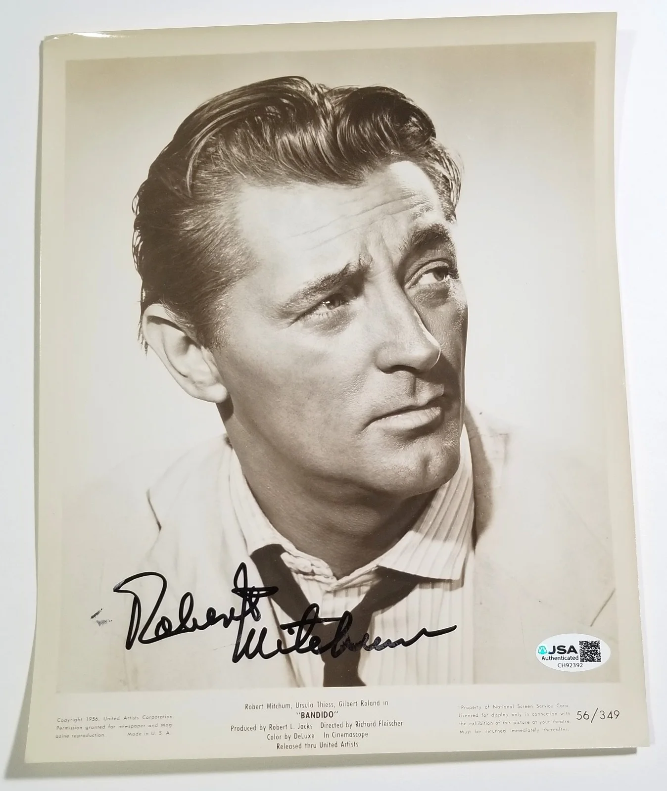 Robert Mitchum — Robert Mitchum REAL hand SIGNED 1956 Bandido Promo Photo JSA COA Autographed