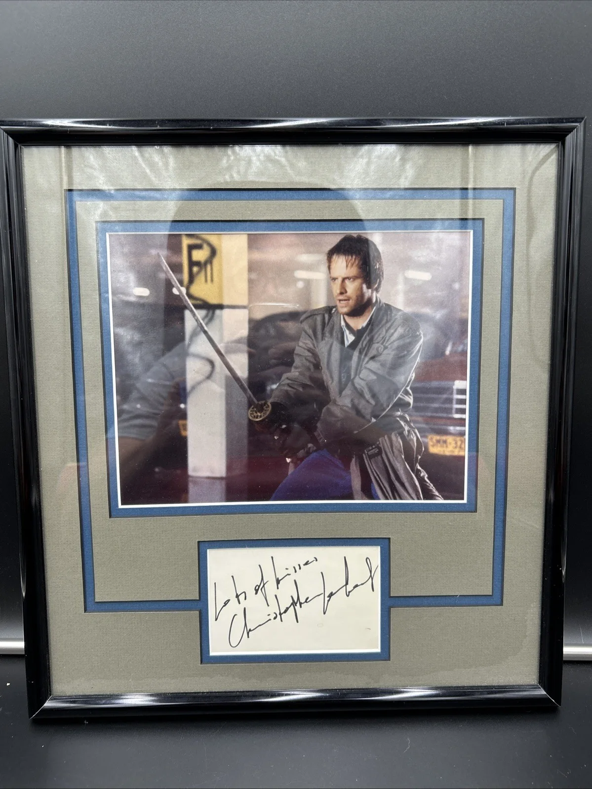 Christopher Lambert — Christopher Lambert Highlander Signature Framed and Matted Photo with COA