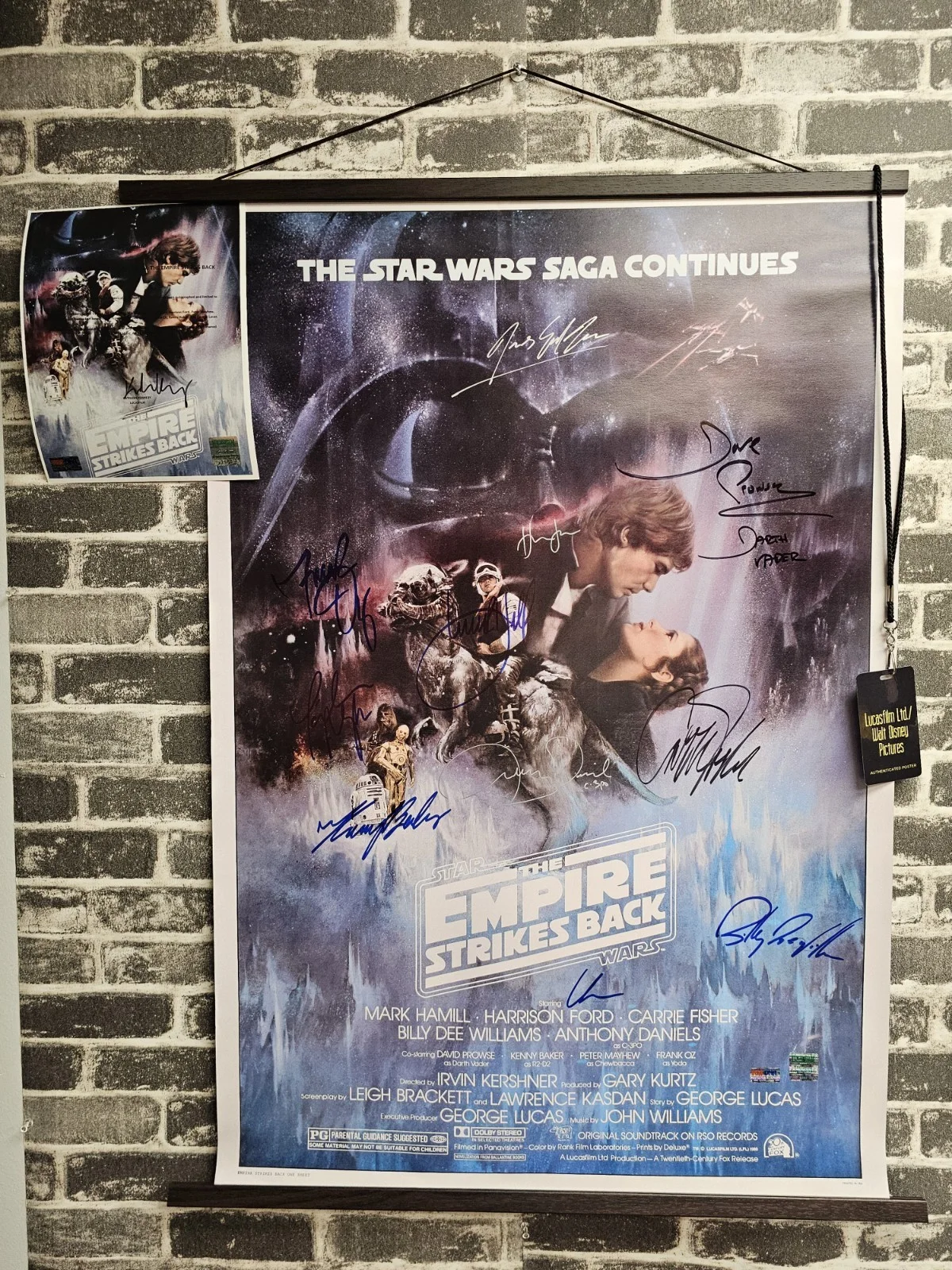 Lucas, Hamill, Fisher — Star Wars: The Empire Strikes Back Signed Autographed 27X40 Lucas, Hamill + 8