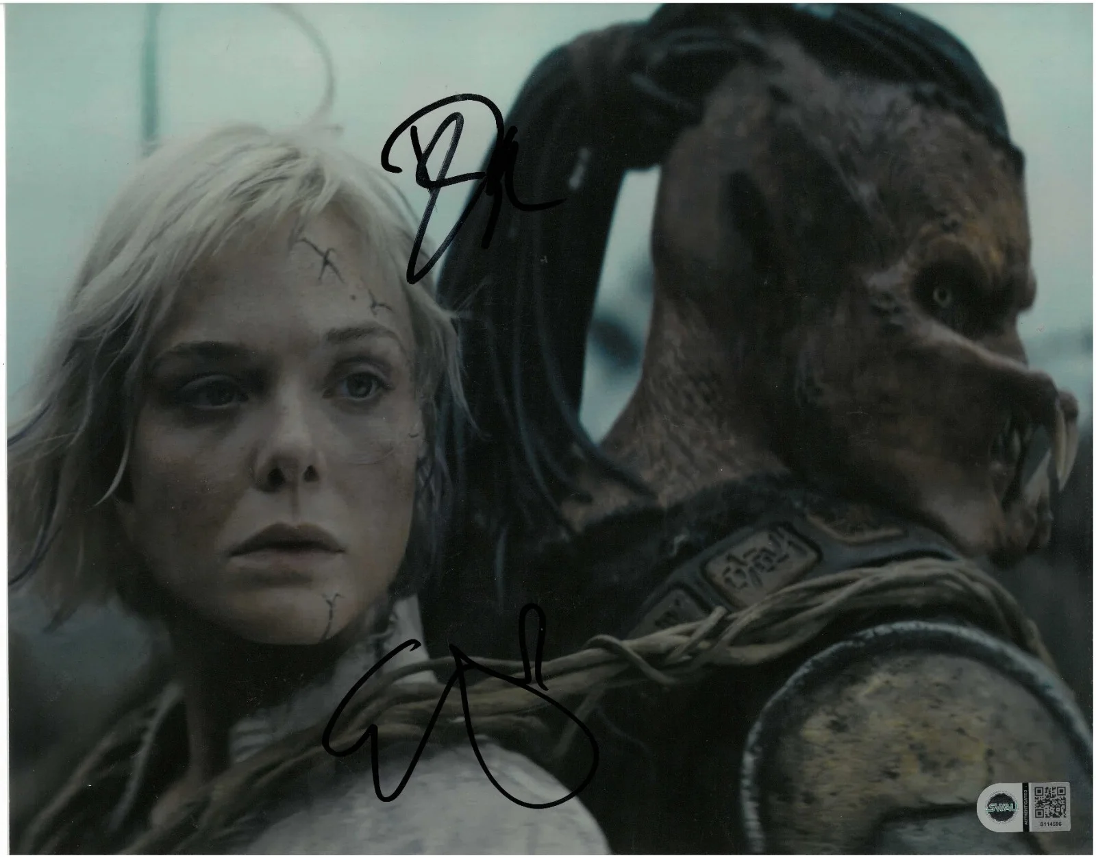 Elle Fanning, Dimitrius Koloamatangi — Elle Fanning Dimitrius Koloamatangi Signed Predator Badlands 11x14 SWAU COA