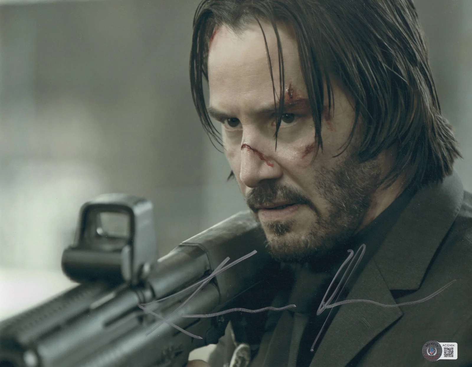 KEANU REEVES — KEANU REEVES SIGNED JOHN WICK 11X14 METALLIC PHOTO AUTOGRAPH BAS BECKETT COA