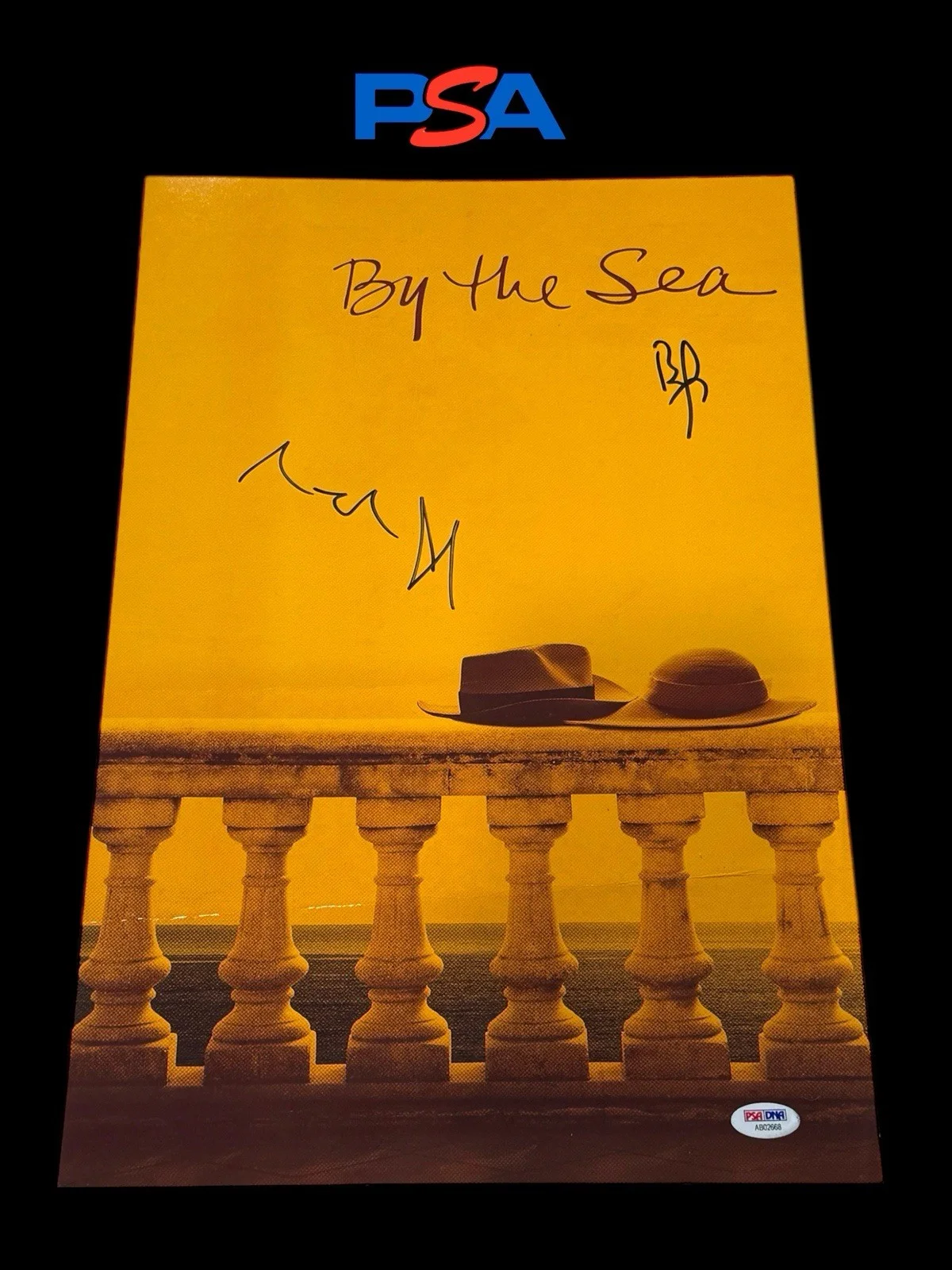 Angelina Jolie + Brad Pitt — ANGELINA JOLIE + BRAD PITT SIGNED AUTOGRAPH BY THE SEA 12x18 PSA