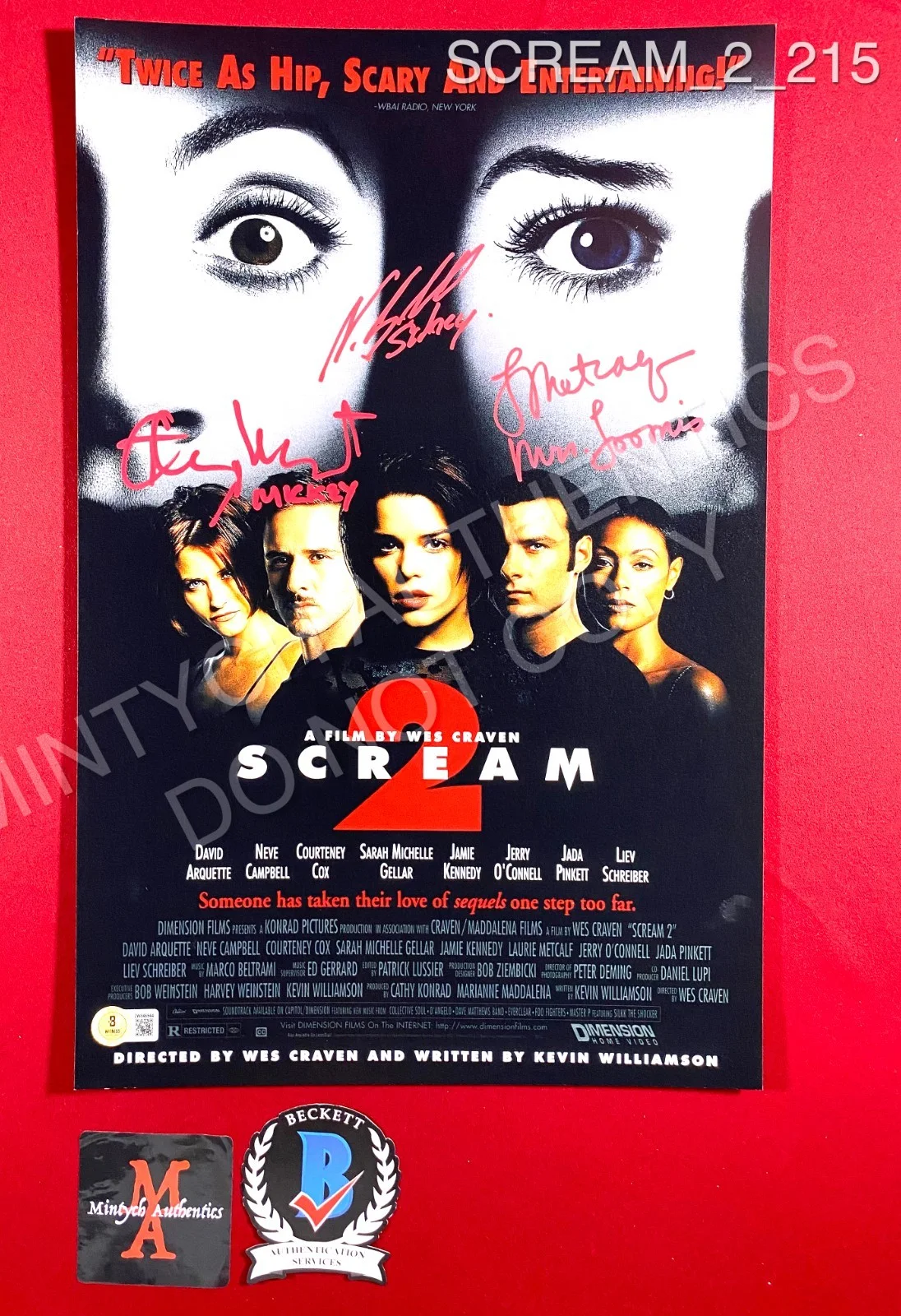 Timothy Olyphant, Laurie Metcalf, Neve Campbell — Scream 2 cast signed 11x17 photo Olyphant Neve Campbell Metcalf Beckett COA
