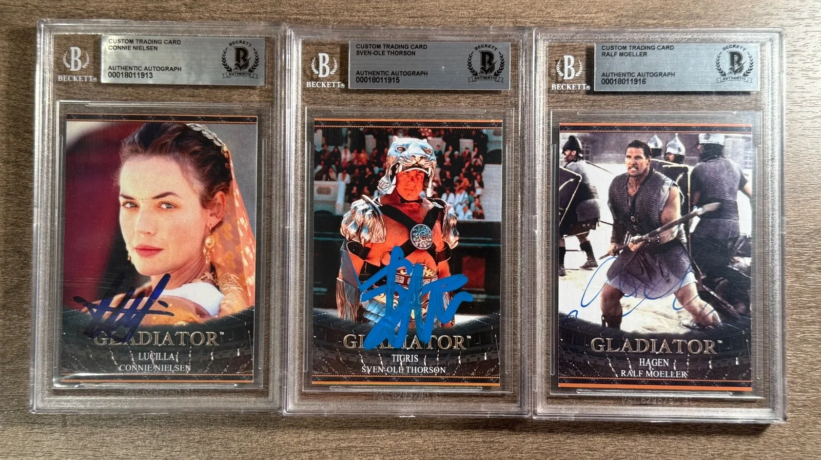 Connie Nielsen — 3 Gladiator Cards Signed Connie Nielsen Sven-Ole Thorson R Moeller Auto Beckett