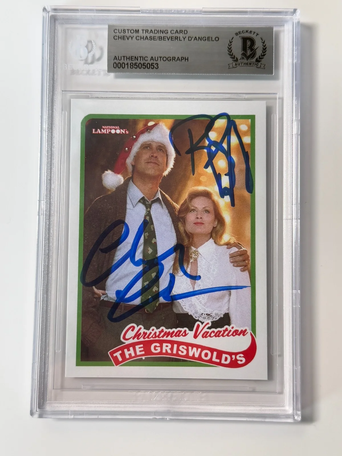 Chevy Chase & Beverly D'Angelo — Chevy Chase & Beverly D' Angelo Autographed Christmas Set Card BECKETT AUTH AUTO