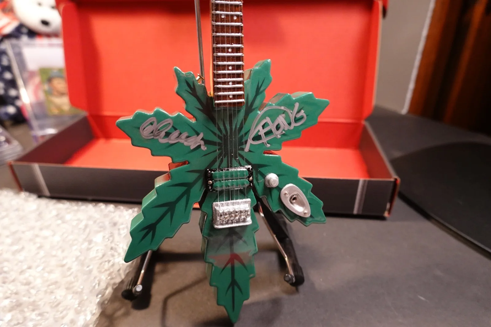 Cheech Marin, Tommy Chong — Cheech Marin Tommy Chong Signed Pot Leaf Mini Guitar (10 inch) JSA C132151, image 2