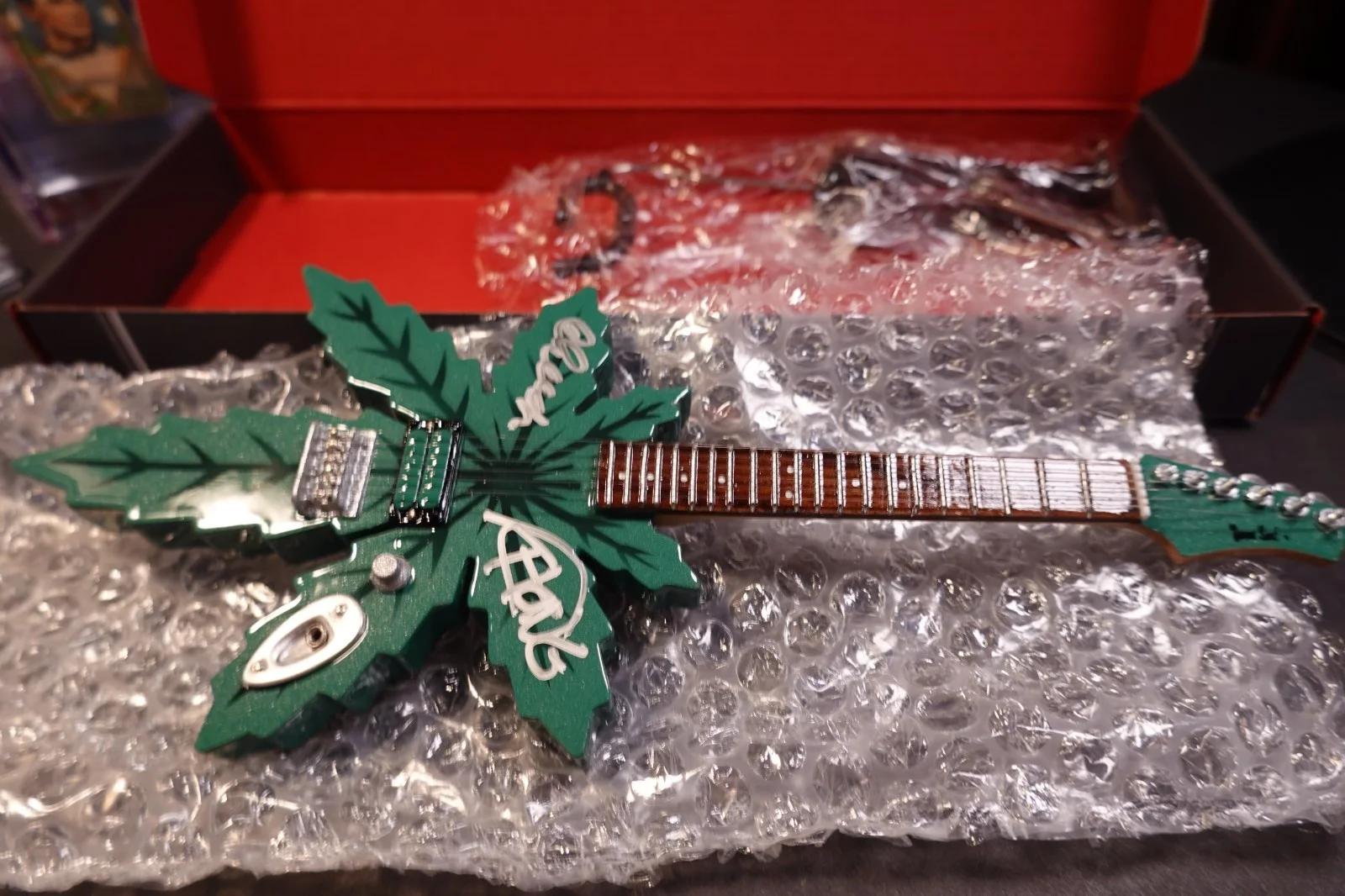 Cheech Marin, Tommy Chong — Cheech Marin Tommy Chong Signed Pot Leaf Mini Guitar (10 inch) JSA C132151, image 5