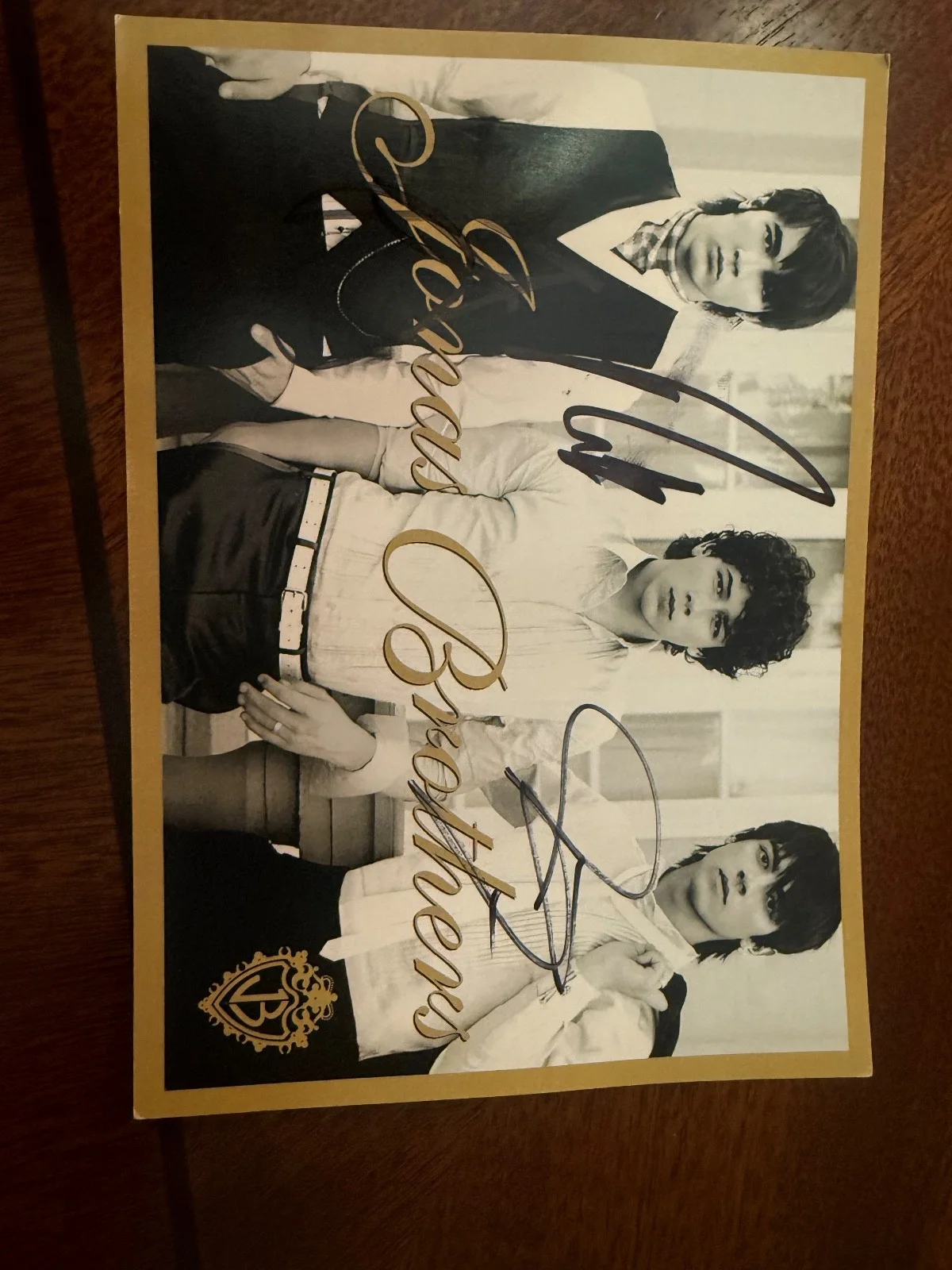 Jonas Brothers — Póster del álbum 7x5 firmado por Jonas Brothers del 08 firmado en un meet and greet