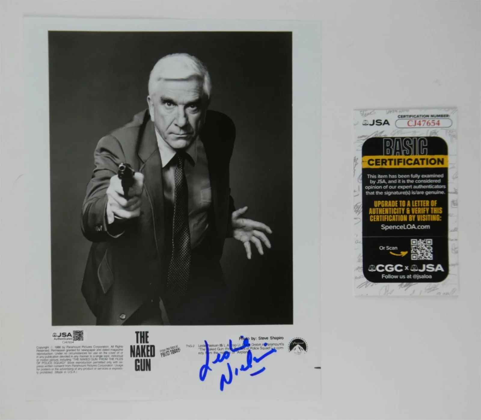 Leslie Nielsen — Leslie Nielsen Signed B&W 8x10 Promo Photo The Naked Gun Autographed JSA COA