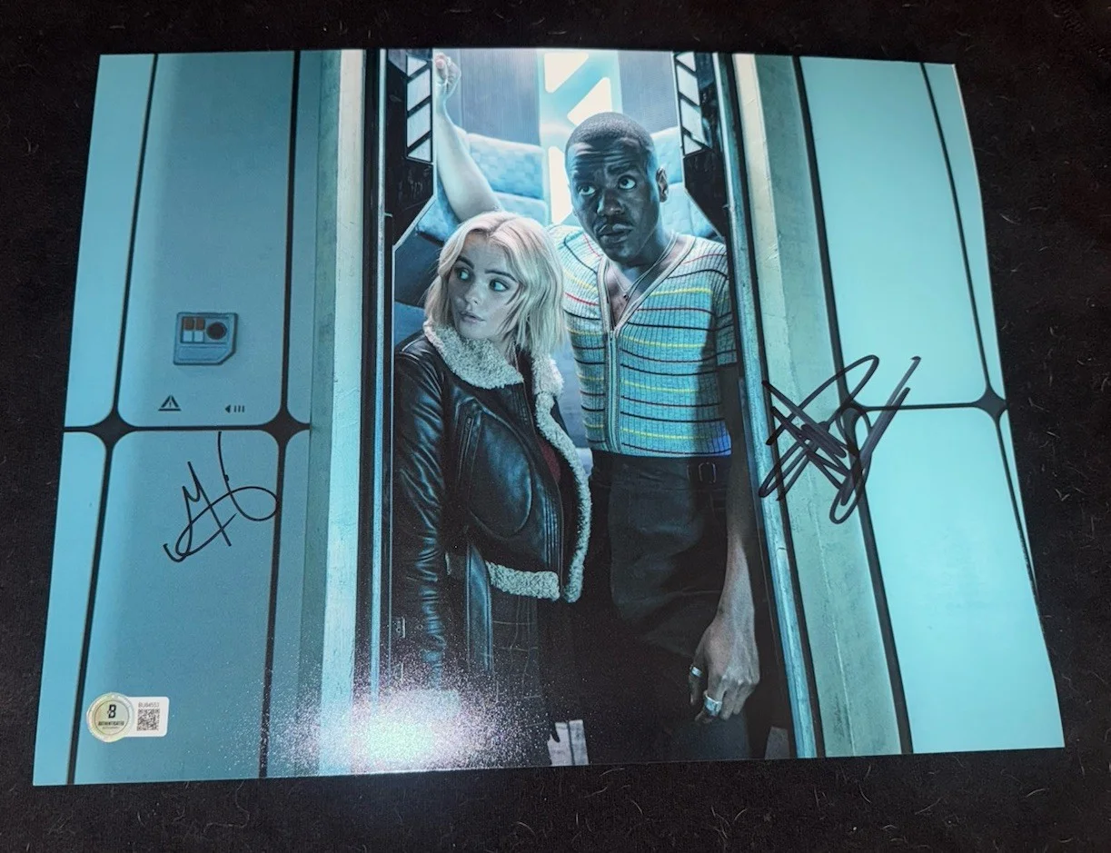 Ncuti Gatwa, Millie Gibson — Ncuti Gatwa signed 11x14 photo Doctor Who Millie Gibson posterRuby Sunday BAS